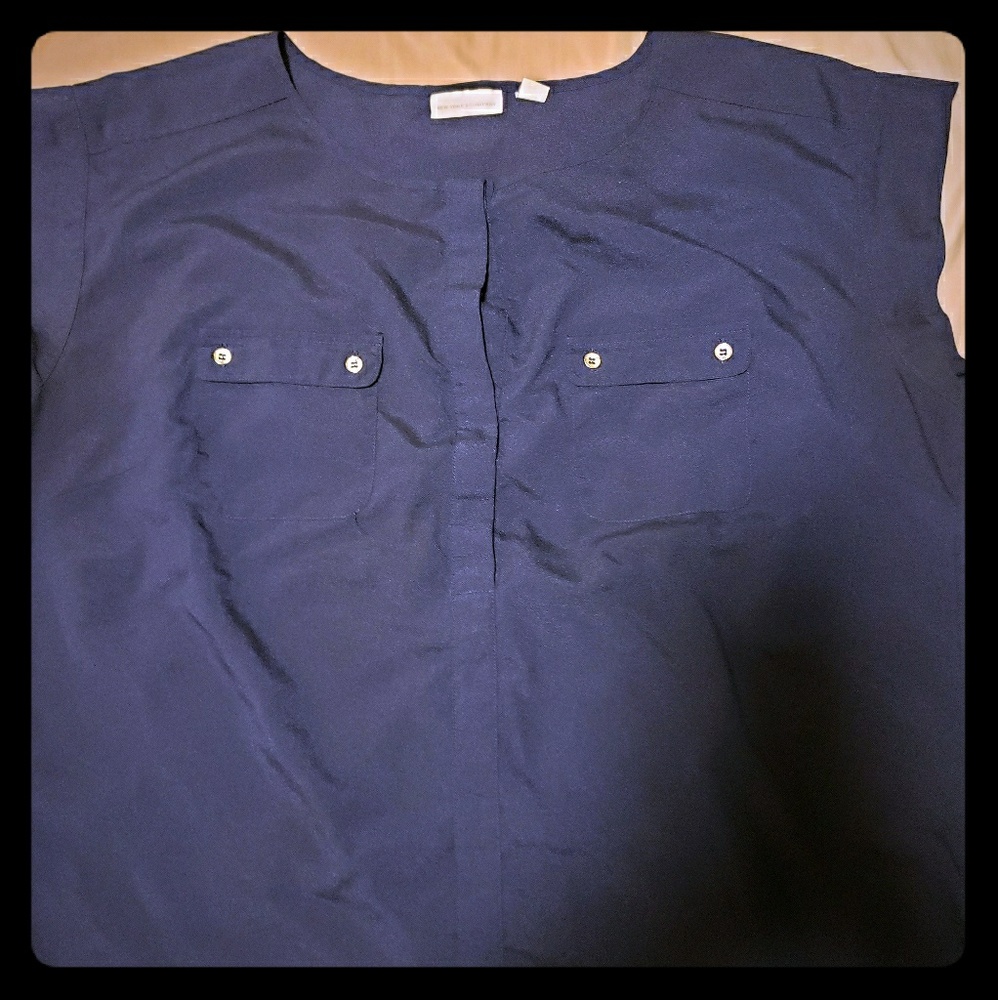 Sleeveless blue blouse